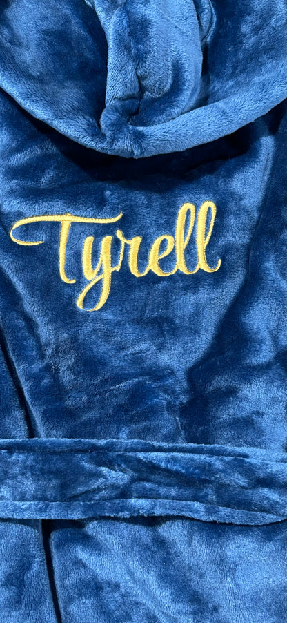 Plush fleece navy blue bathrobe with hood and personalized embroidery name on back.