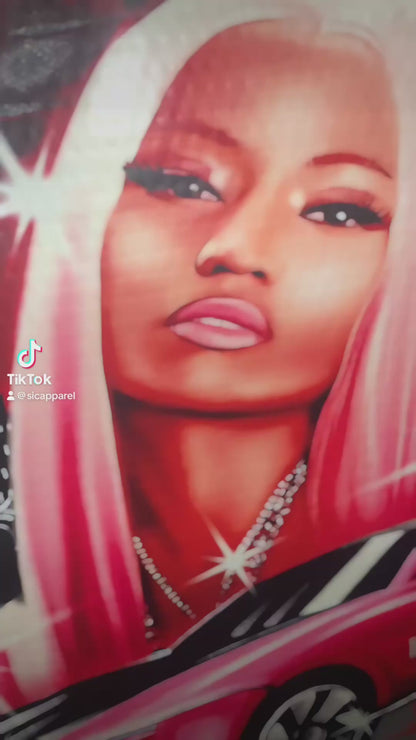 Video of Nicki Minaj dtf transfer before and after print on black shirt