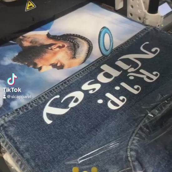 video of dtg printing on denim jackets