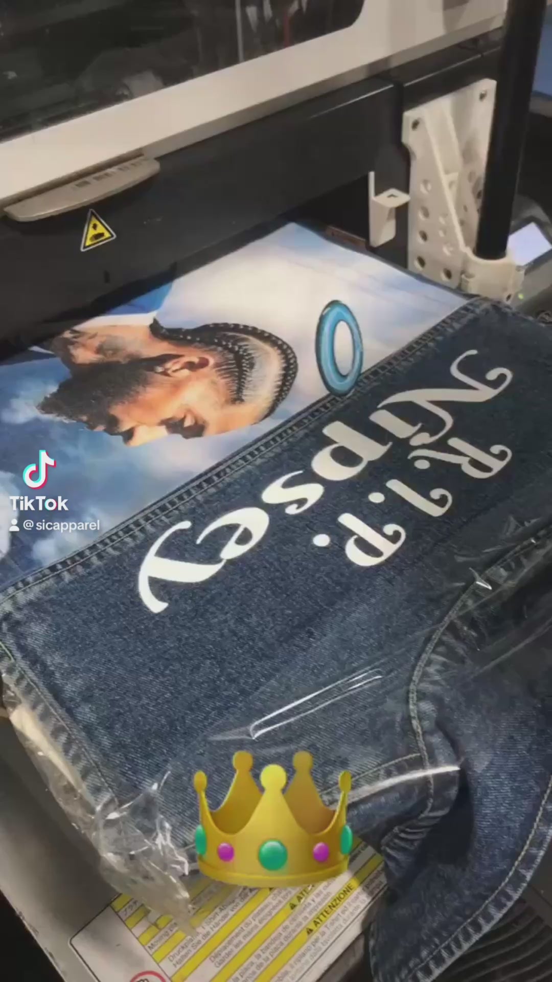 video of dtg printing on denim jackets