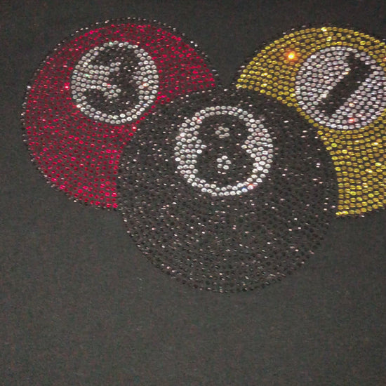 Video of custom rhinestone design on womens black t shirt